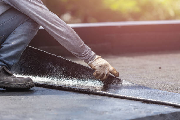 Professional Basement Waterproofing technician working in Elma, WA